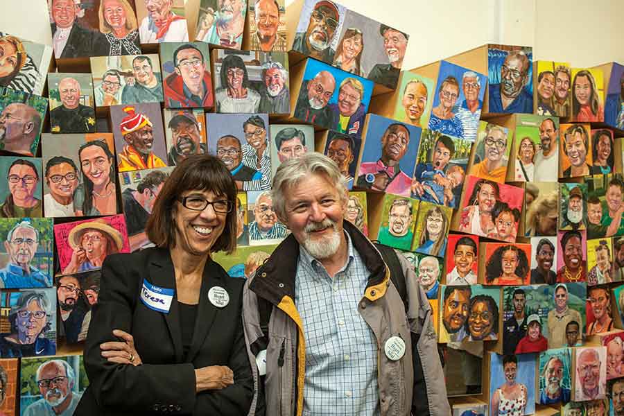 Teresa Amott and husband Ray Miller at an exhibition of Galesburg community portraits.