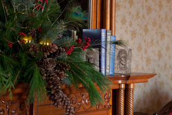 Winter decorations on the mantle in the Gale House.