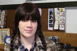 Rebecca Beno with her photo booth picture strips