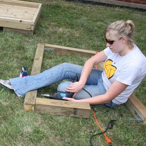 Sarah West '09 built a sod-based platform that the Prairie Fire football players used during her research.