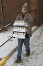 A student delivers food for local children