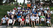 Knox cross country teams with their bags of garbage