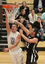 A Knox men's basketball player puts one in.