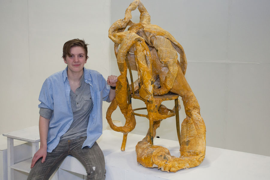 Emma Lister '17 with her sculpture "Henrik"
