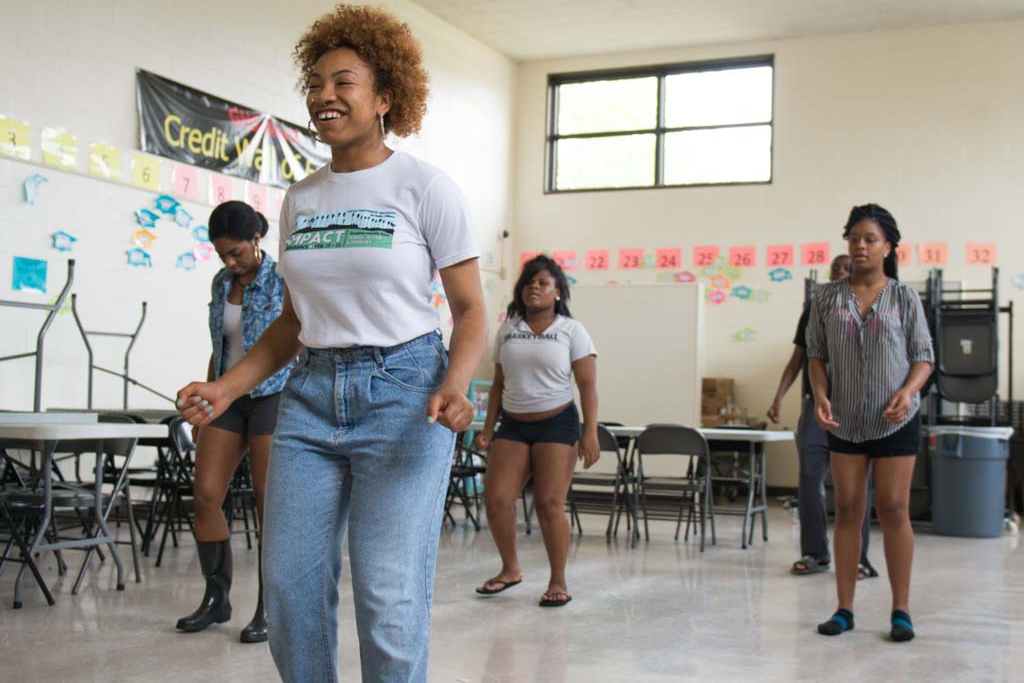 Angela McNeal works with students at Galesburg North High School as part of her Steppin' Up Class. 