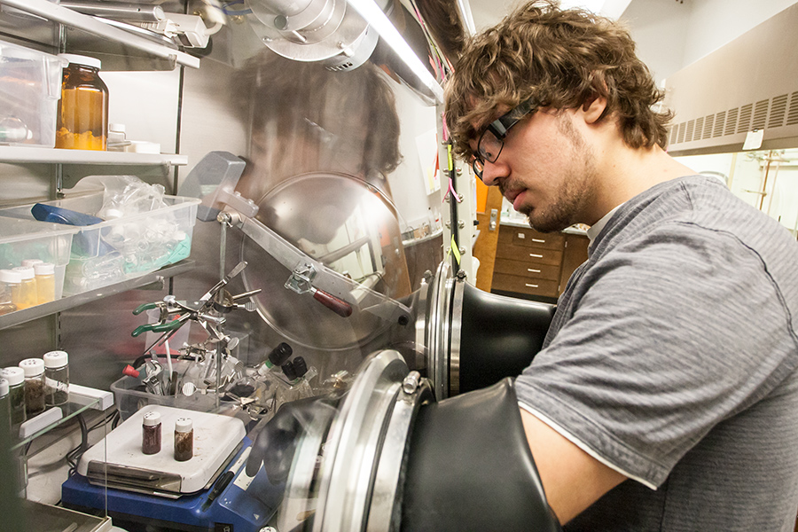 As a Knox student, Michael Supej used a nitrogen-filled glove box to work with an iron compound during a chemistry research project