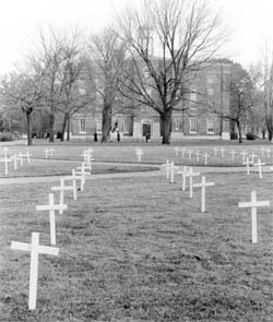 The South Lawn of Old Main on Election Day 1968. The crosses represented the American soldiers who had died in Viet Nam, and a poster of the Argentinean revolutionary Che Guevara adorned Old Main.