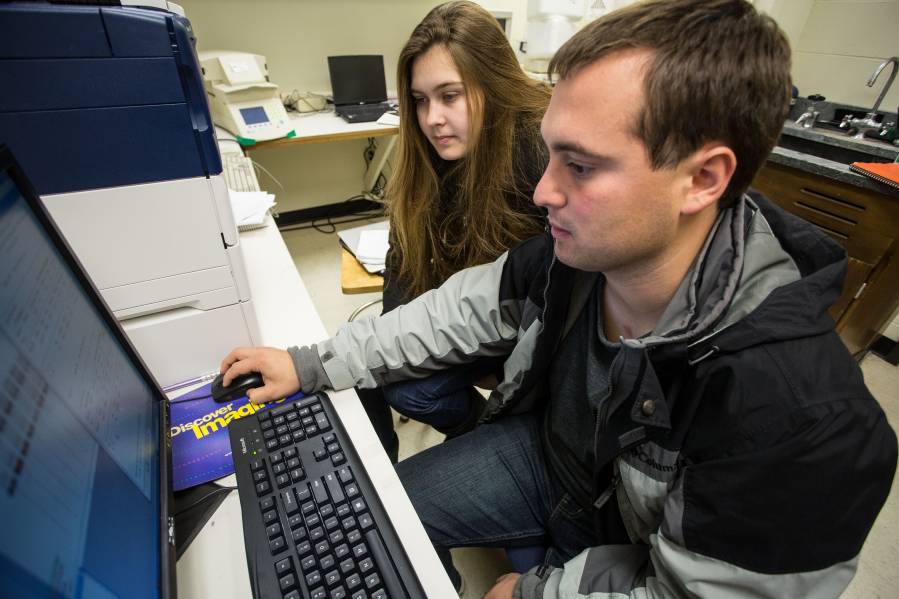 Knox College students analyze imaging data for their biochemistry research.