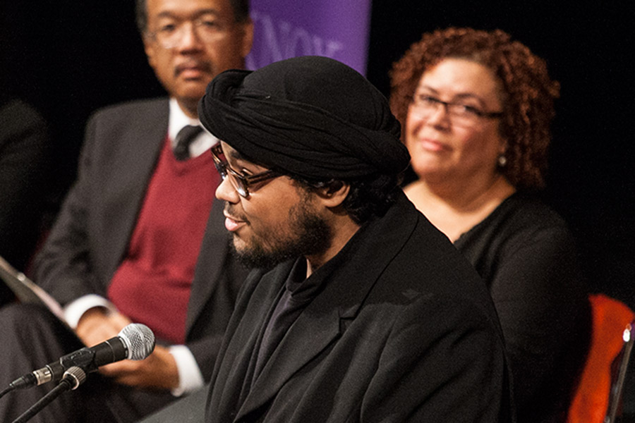 Cristian Gorostieta '15 reads poetry at the 2014 Martin Luther King Day Convocation.