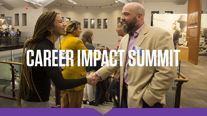 A student and alumnus shake hands at the 2019 Knox College Career Impact Summit