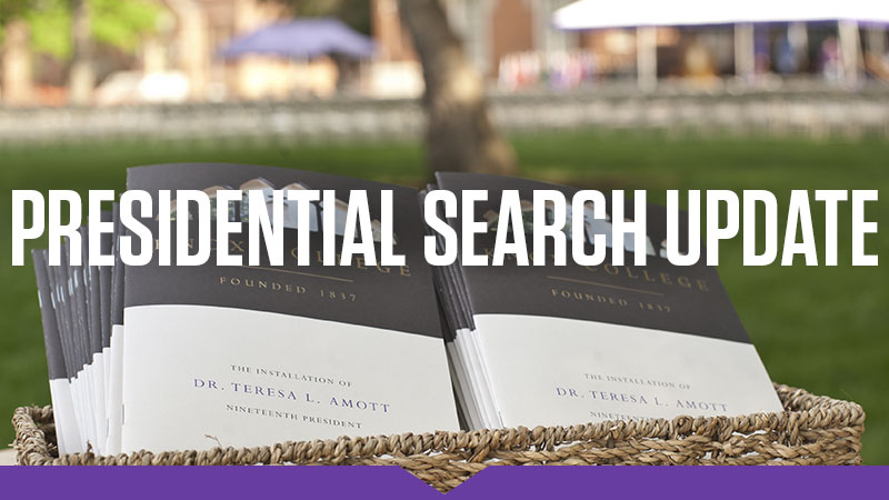 Presidential Search Update: Printed programs for the installation of President Teresa Amott in a basket on the south lawn, with Old Main in the distance