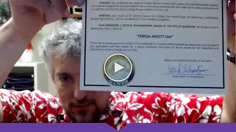 Galesburg mayor and Knox professor Peter Schwartzman shows an official proclamation declaring June 2 "Teresa Amott Day."