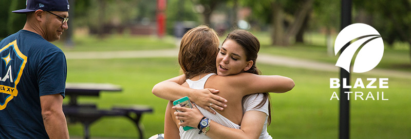 Families say good-bye during new student orientation at Knox College