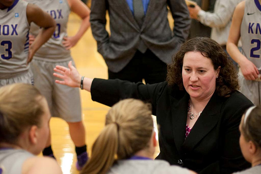 Women's Basketball Coach Emily Cline mentors her team from the sidelines.