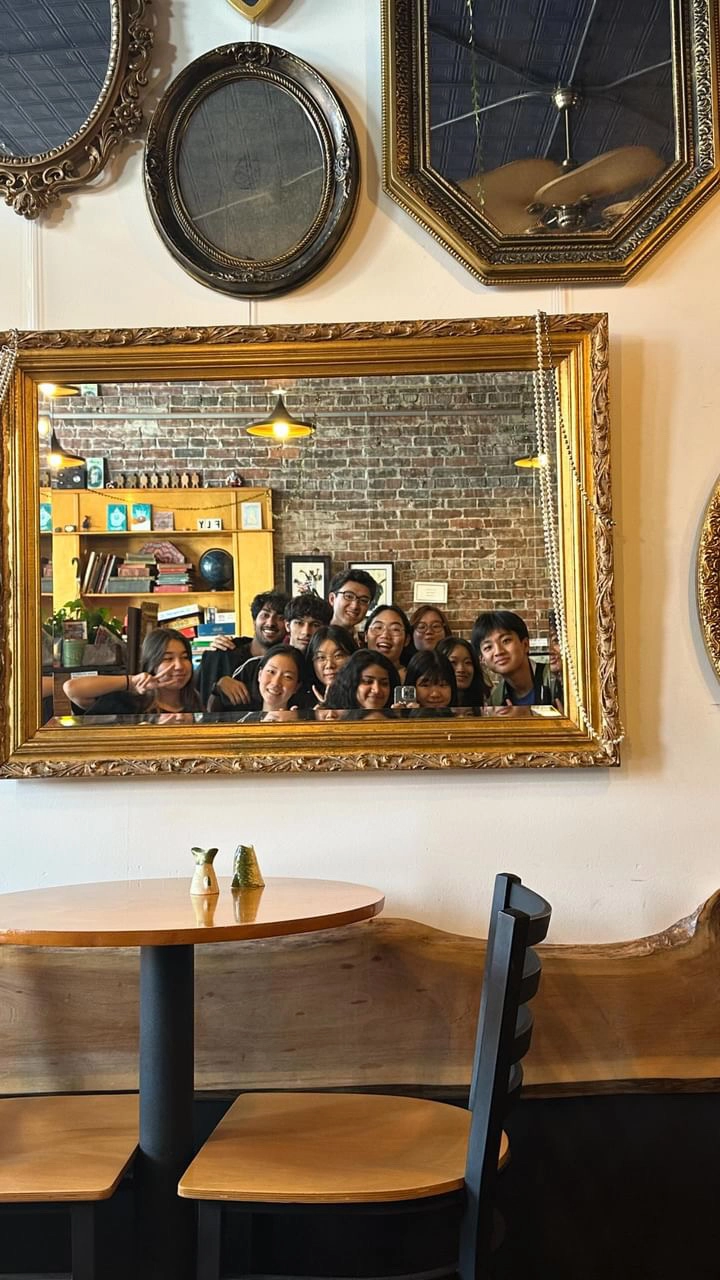 another picture of students posing (a mirror selfie)