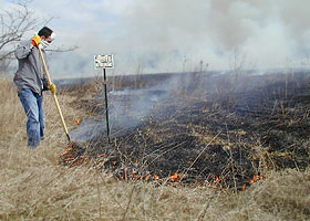 Maintaining line at prairie fire.