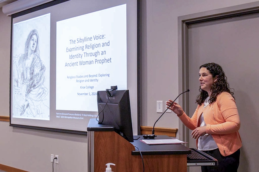 Keynote speaker Professor Olivia Stewart Lester stands at the podium.