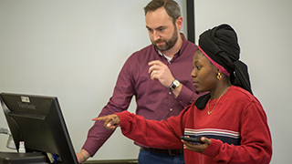 Faculty and students in the classroom