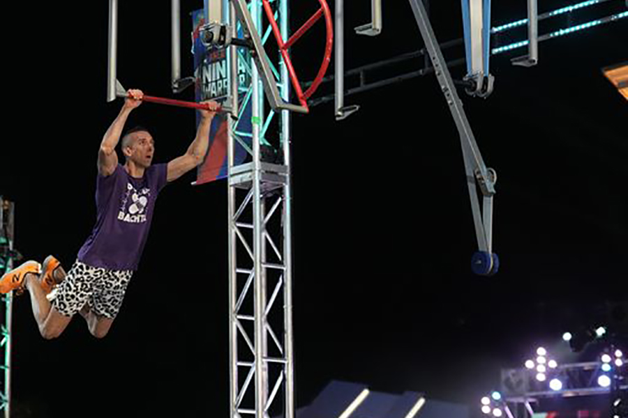 Steve Bachta, '03 completes an American Ninja Warrior obstacle. 