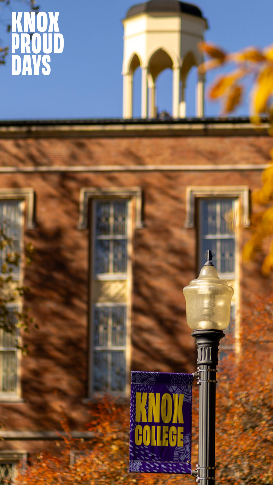 A photo of Old Main with a Knox banner in front of it and text in the top left corner that reads Knox Proud Days