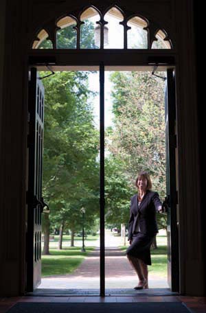 Knox President Teresa Amott at the door to Old Main