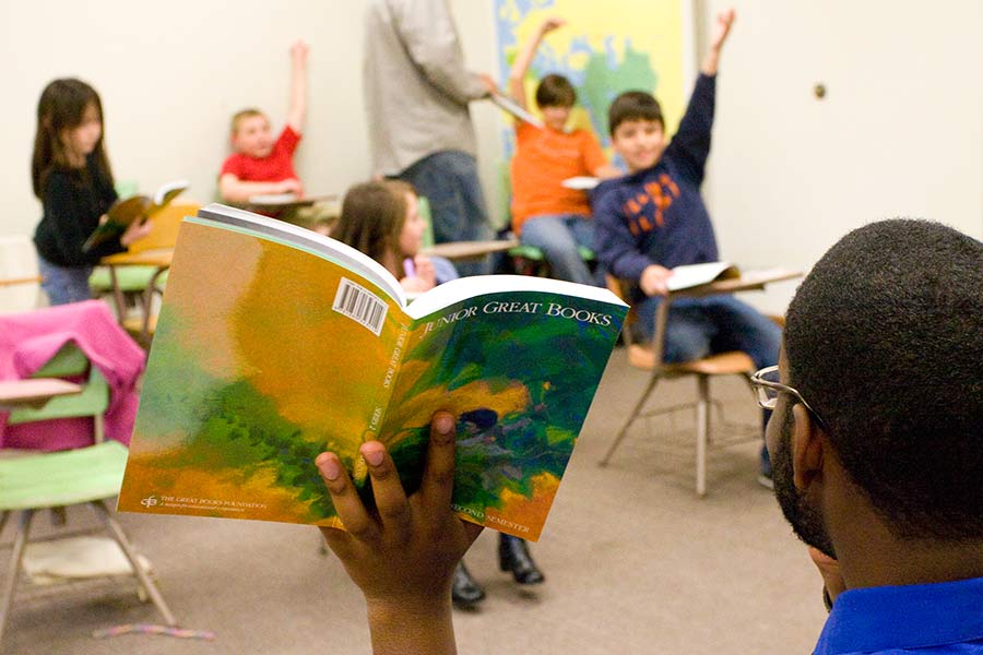 Jordan Lanfair lead a Junior Great Books discussion with several grade school students.