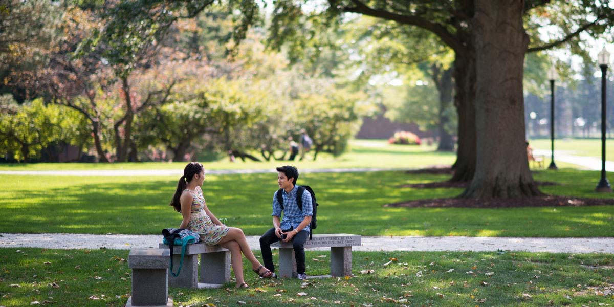Students chat on a spring day at Knox College.