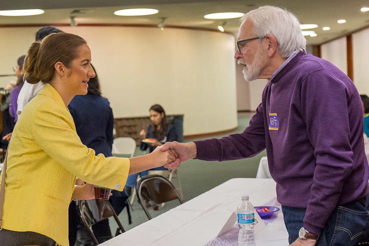 Knox College alumni and students participate in a career networking event.