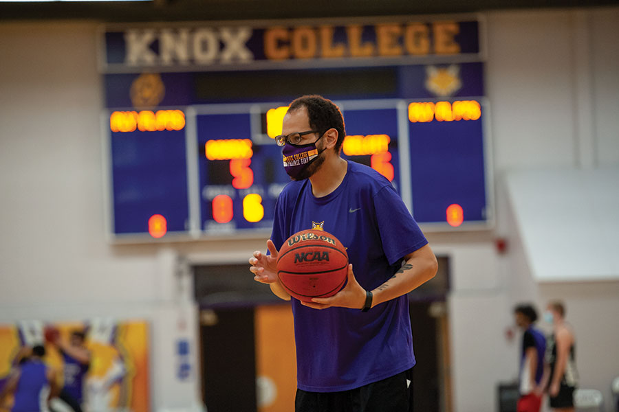 New Assistant Men's Basketball Coach Randy Jackson offers advice to players during a fall practice