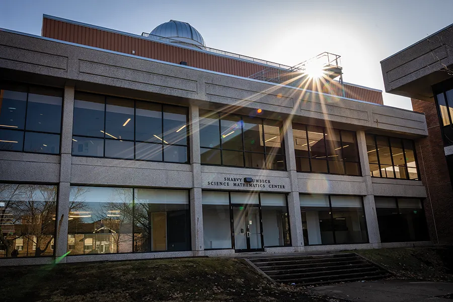 Umbeck Science-Mathematics Center, with the sun shining over the roof.