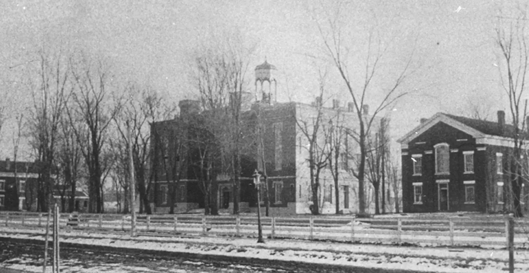 A black and white photo of Old Main, circa mid-1800s.