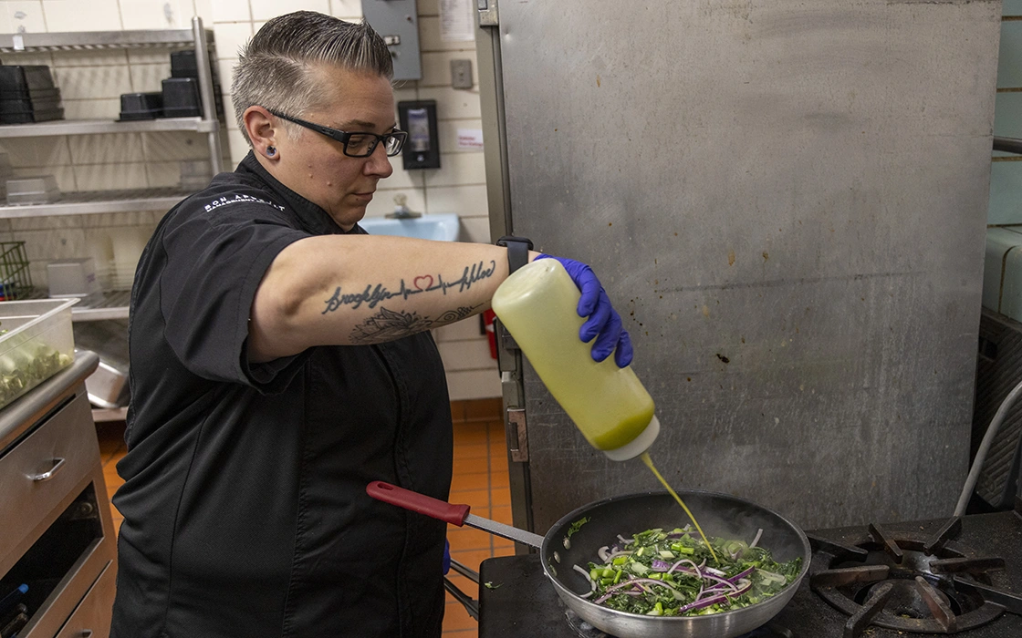 Chef cooking at the college cafeteria
