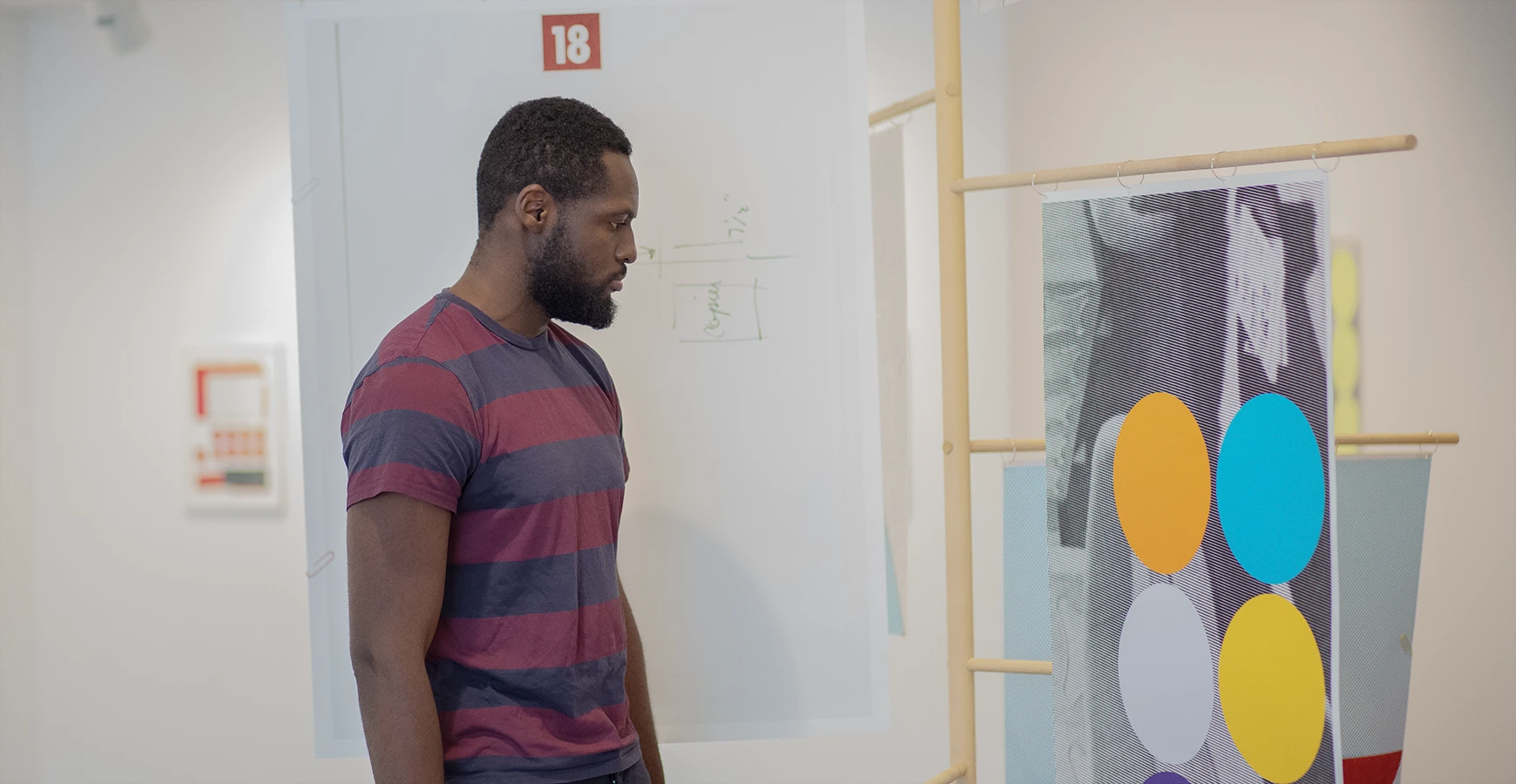 A student views art.