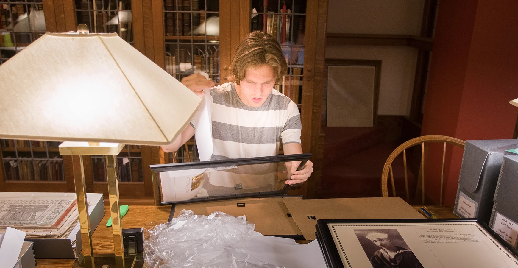 A student views a Veterans Memorial exhibit. 