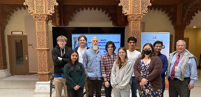A Religious Studies class stands inside the BAPS Shri Swaminarayan Mandir of Chicago, Illinois.