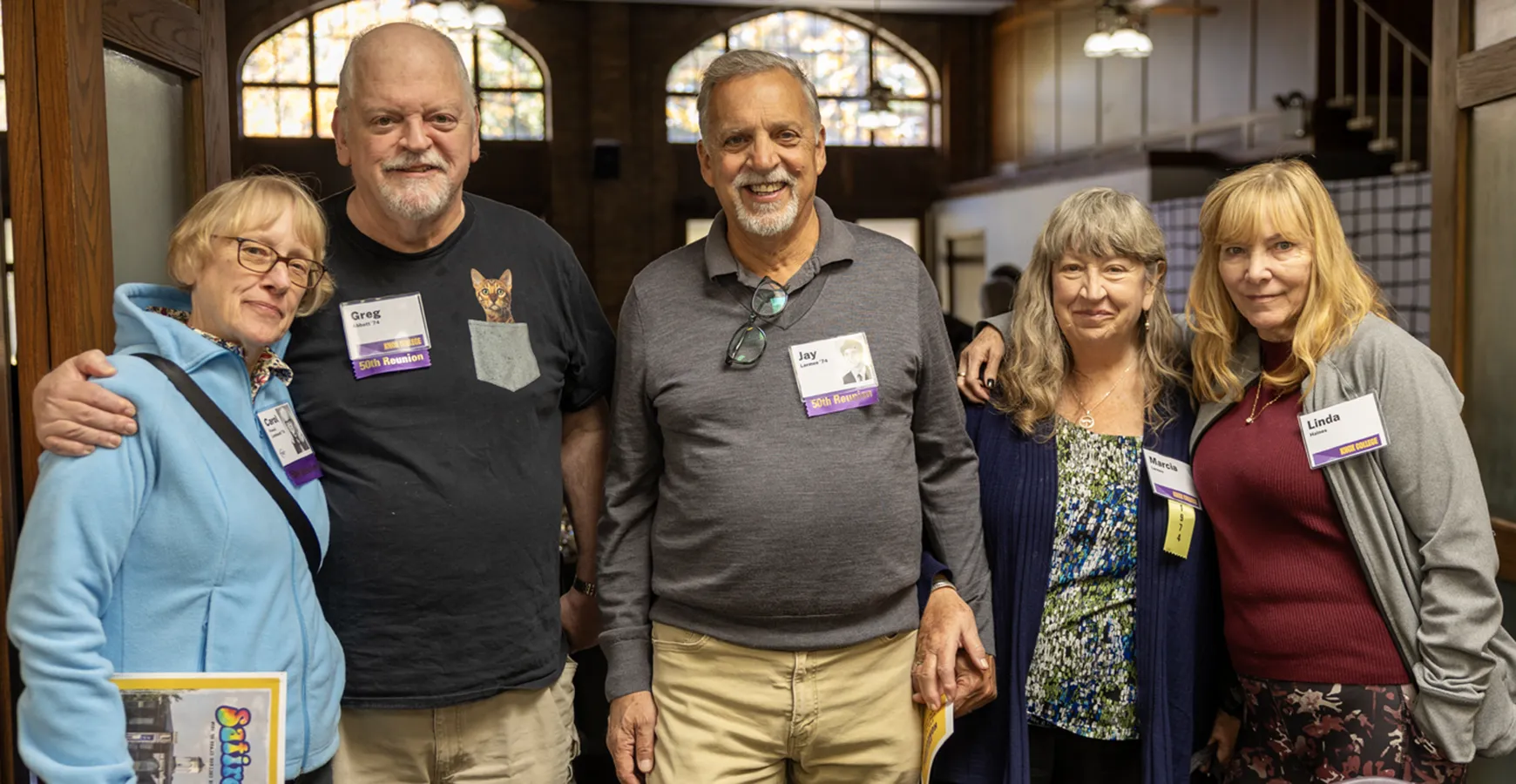 Five members of the 50th Reunion class pose and smile at the camera.