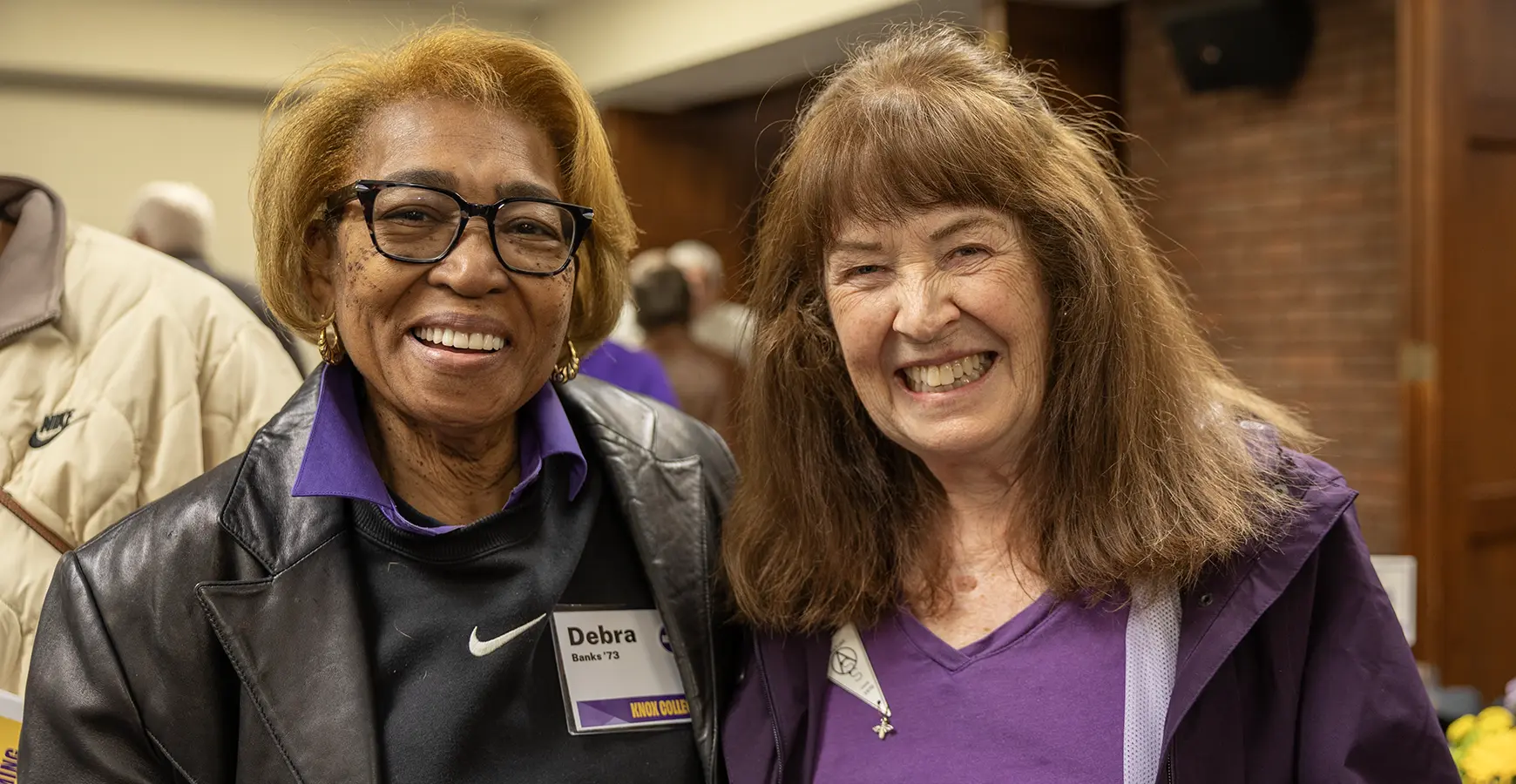 Two members of the 50th Reunion class pose and smile at the camera.