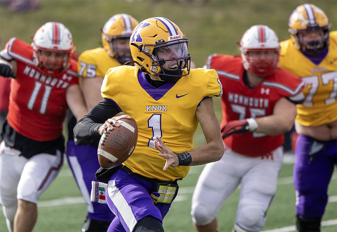 A Prairie Fire football player runs with the ball.