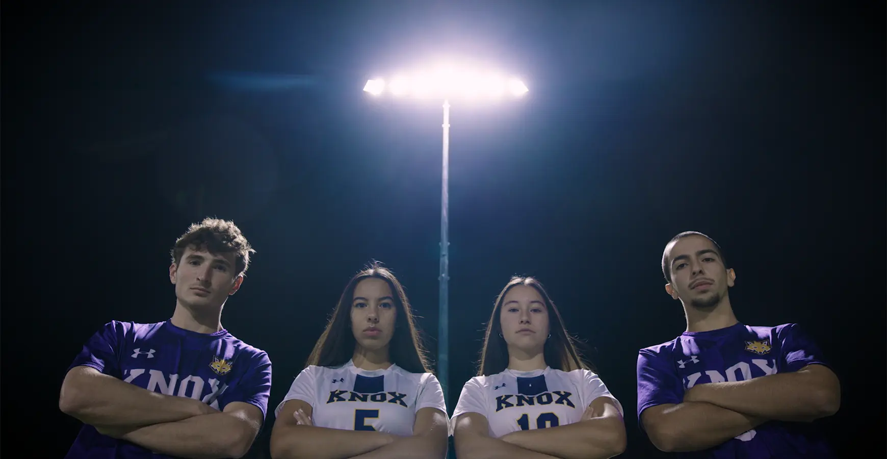 4 students (soccer players) pose in front of the camera in the field. On the video, the men's gameplay footage from October 7, 2025 vs Monmouth College while the women's gameplay footage from October 8, 2025 vs Monmouth College.