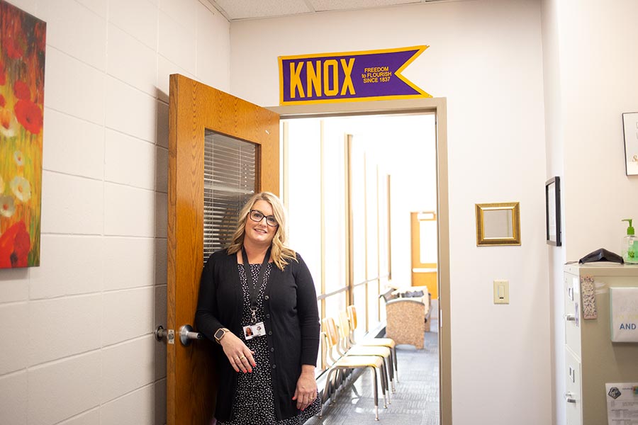 Mindi Ritchie '99 Stands in the Hallways of Galesburg High School North