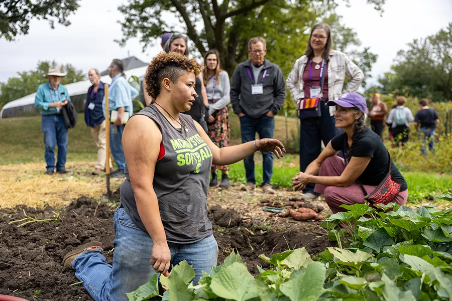 Knox students, faculty, alumni, staff, and friends participate in a Knox Farm tour.