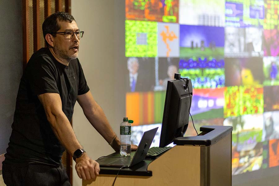 Michael Takeo Magruder gives a lecture on his work