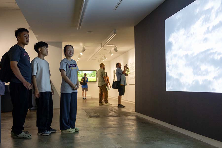 Knox College students view the gallery at the opening of the Artist-in-Residence gallery