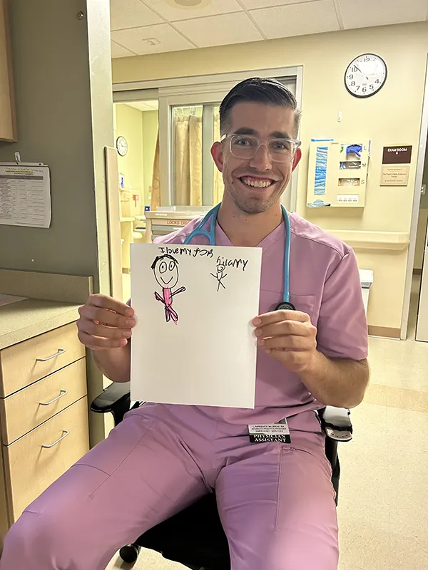 Lawrence Murray showcases art from an appreciative patient.