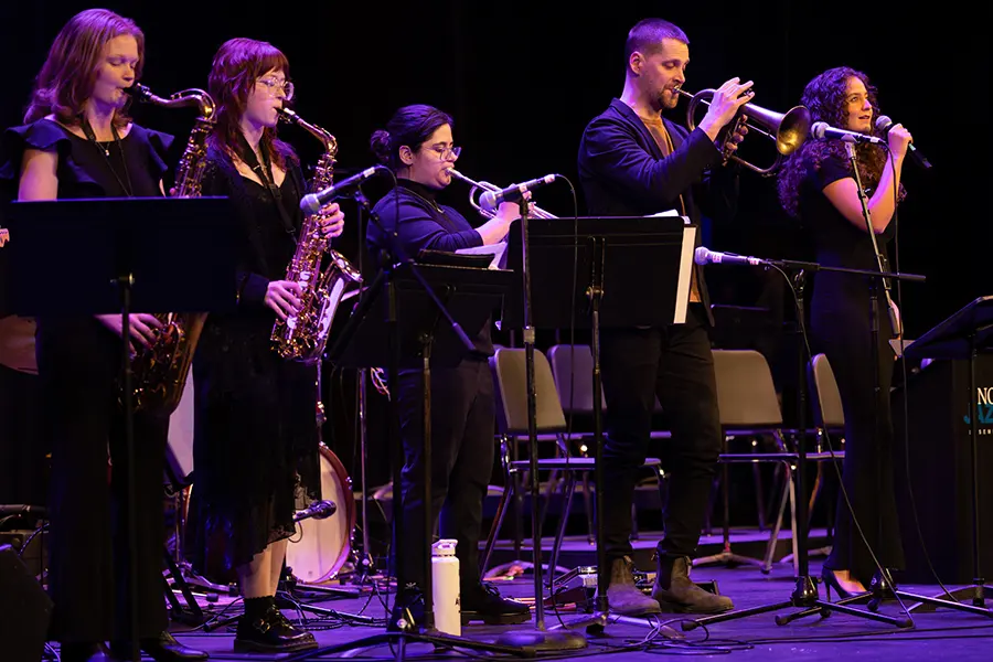 John Raymond performs with members of the Cherry Street Combo.