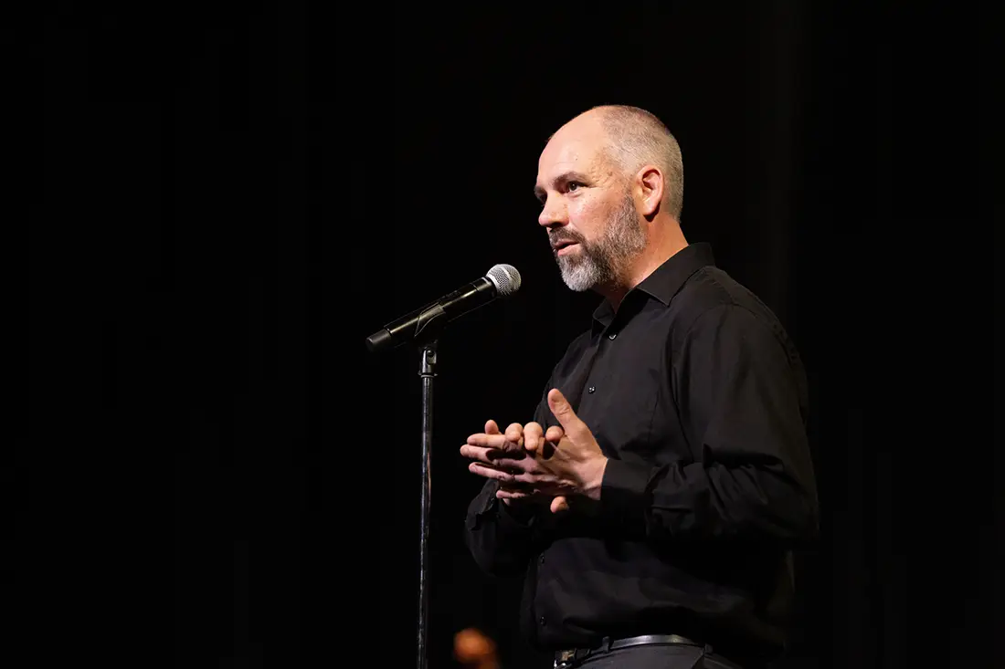Andy Crawford talks to the audience at the Orpheum Theatre