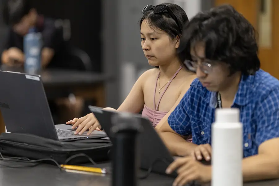 Summer Science Program students work during class.