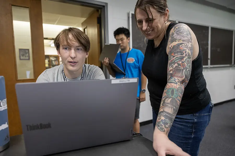 Associate Professor of Astronomy and Director of the Knox Observatory Nathalie C. Haurberg ’06 talks with a student.