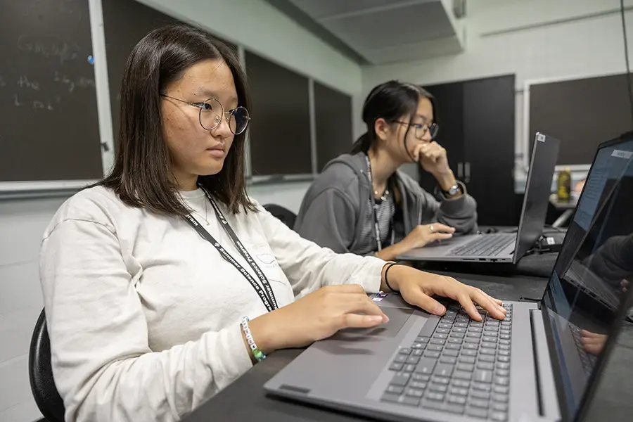 Summer Science Program students work during class.