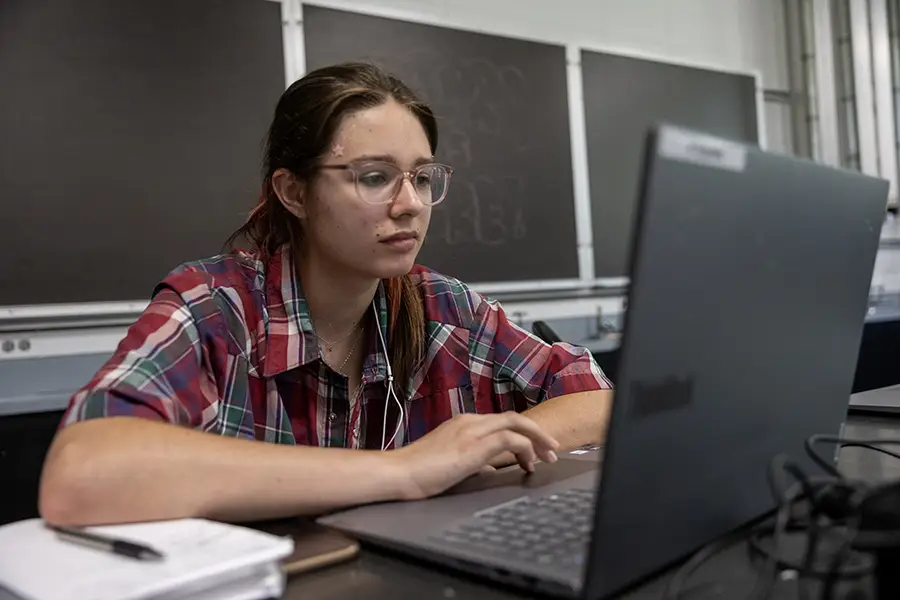 Summer Science Program students work during class.